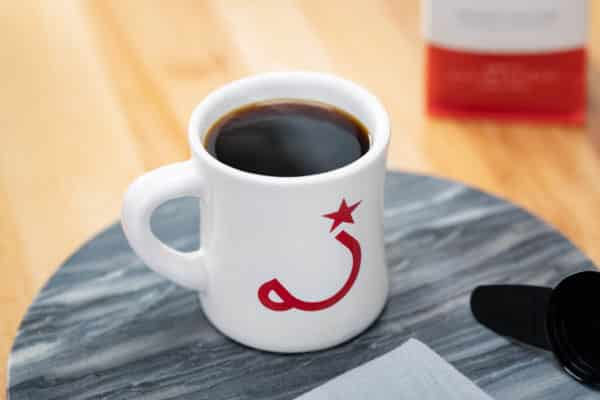 Ritual coffee mug on stone round