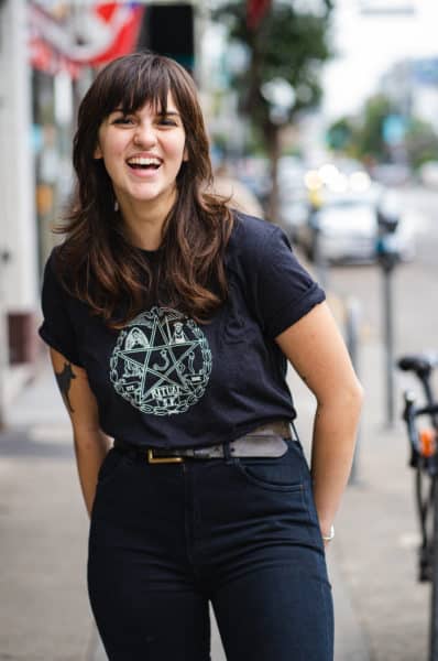 Person wearing pentagram tee on the street
