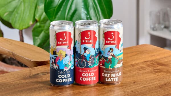 Ritual's canned coffees places on a wooden table
