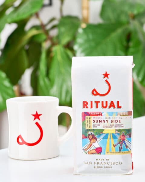 Mug with an espresso bag on the counter.
