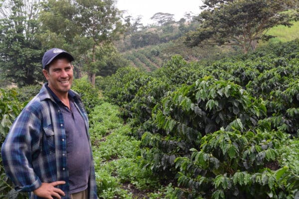 Evin Moreno in front of his farm